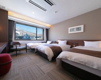 Hotel Munin Furano - Furano - Schlafzimmer
