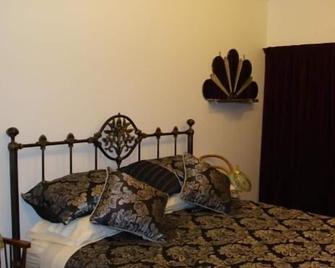 Historic Stone Cottage - Clyde - Camera da letto