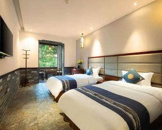 Aroma Tea House Former Jing Guan Ming Lou Museum Hotel - Guilin - Bedroom