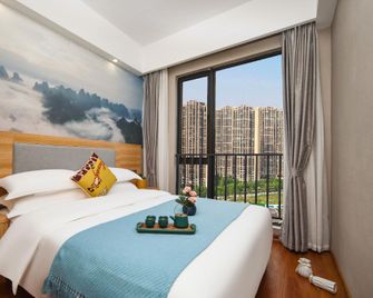 Youbo Life Hotel (Guilin Peanut Tang Shopping Center Store) - Kuej-lin - Ložnice