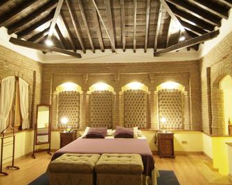 Hotel Palacio de Oñate - Guadix - Schlafzimmer