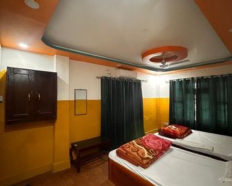Alpine family hotel and lodge - Birtamod - Habitación