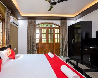 Vihaan Inn Guest House - Calangute - Camera da letto