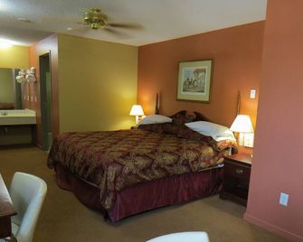 First Western Inn - Caseyville - Спальня