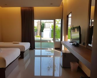 At Muangploy Resort - קאנצ'אנאבורי - חדר שינה
