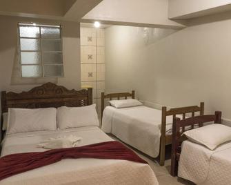 Comfort Suite 104 - Diamantina - Camera da letto