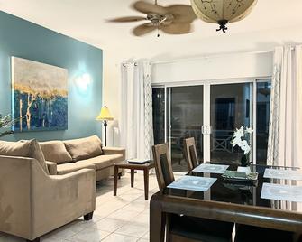 Paradise Breeze Penthouse- Majestic Ocean Views -Central Location - Venetian Road Settlement - Living room