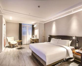 Hanting Premium Hotel (Suzhou Guangqian Street Leqiao Metro Station) - Suzhou - Schlafzimmer