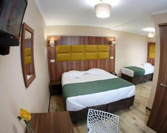 Sun Hotel - Brüssel - Schlafzimmer