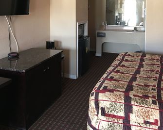 Western Motel - Magee - Bedroom
