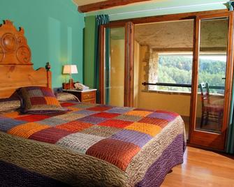 Hotel Rural Campalans - Borredà - Bedroom