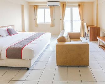 Collection O Serviced Apartmen Mutiara Kota - Bekasi - Bedroom