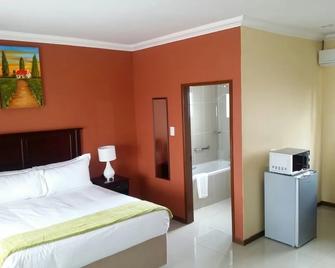 Vido Lodge&Conference Center Plot 78 - Polokwane - Schlafzimmer