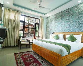 Treebo Trend Roshan House - Dharamsala - Schlafzimmer