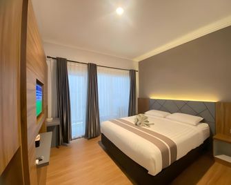 Papito Hotel Pangandaran - Pangandaran - Schlafzimmer
