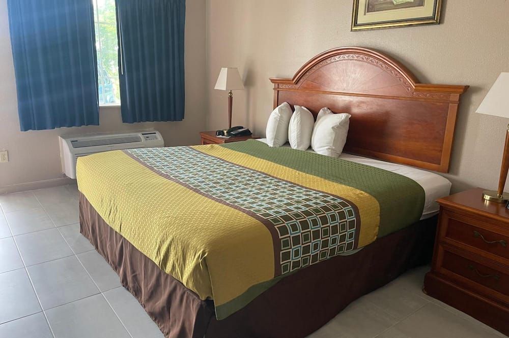 Highland Inn Denham Springs Baton Rouge East - Denham Springs - Bedroom