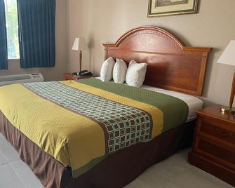 Highland Inn Denham Springs Baton Rouge East - Denham Springs - Bedroom