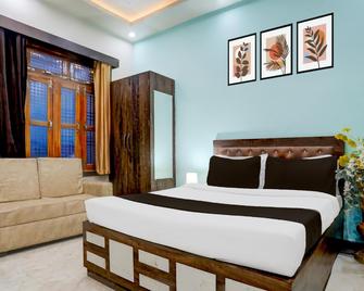 Super Hotel O Amhat Sultanpur City - Sultānpur - Bedroom