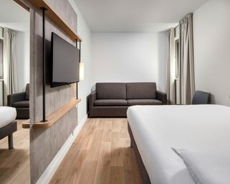 ibis budget Beauvais Aeroport - Tillé - Спальня