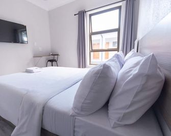 Ecomotel Marlboro - Sandton - Quarto