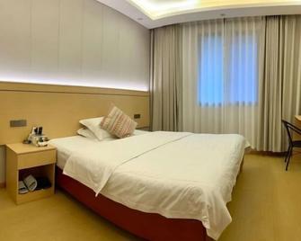 Tashan Hotel - Nanchong - Bedroom