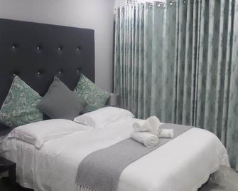 The Grand Orchid Guesthouse - Durban - Bedroom