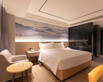Shenzhen Xindazhou Hotel (Shenzhen Convention and Exhibition Center Futian Port Store) - Shenzhen - Bedroom