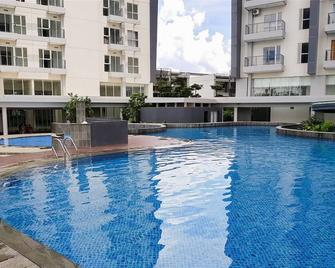Homey and Cozy Studio Casa De Parco Apartement - Serpong - Piscine