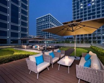 Pagoda Hotel Hangzhou Zijingang - Ханчжоу - Патіо
