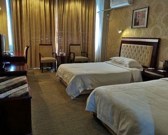 Zhijiang International Hotel - Yichang - Schlafzimmer