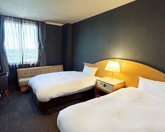 Route Inn Grantia Komatsu Airport - קומאטסו - חדר שינה