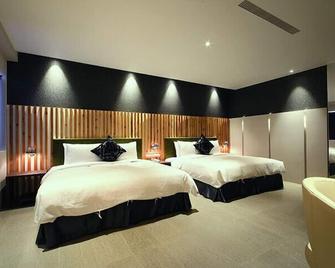 Leesing Hotel - Kaohsiung City - Bedroom