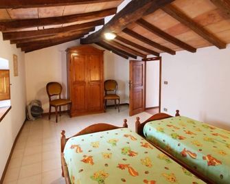 Casale Aiola - Poggioni - Schlafzimmer