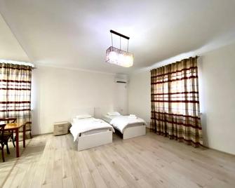Sarai-Batu Guest House - Atyrau - Camera da letto