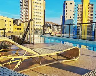 Studio c/ piscina em Poços de Caldas PGO412 - Poços de Caldas - Balcony