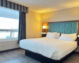 Travelodge by Wyndham Amherst - Amherst - Schlafzimmer