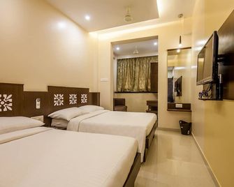 City Guest House - Dadar - מומבאי - חדר שינה