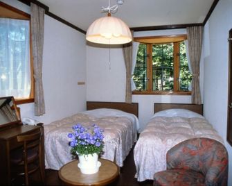 Kusatsu Spa Pension Segawa - Kusatsu - Phòng ngủ