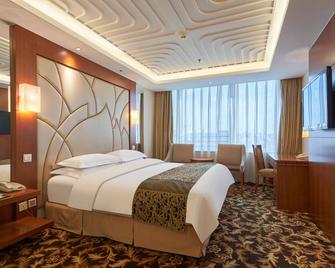 Howard Johnson Paragon Hotel Beijing - Beijing - Bedroom