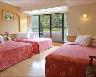 Ali-Shan Dengshan Hotel - Alishan Township - Bedroom