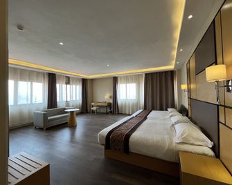 2000 Hotel Downtown Kigali - Kigali - Habitación