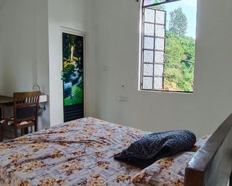 Zion Resortz - Kodaikanal - Bedroom