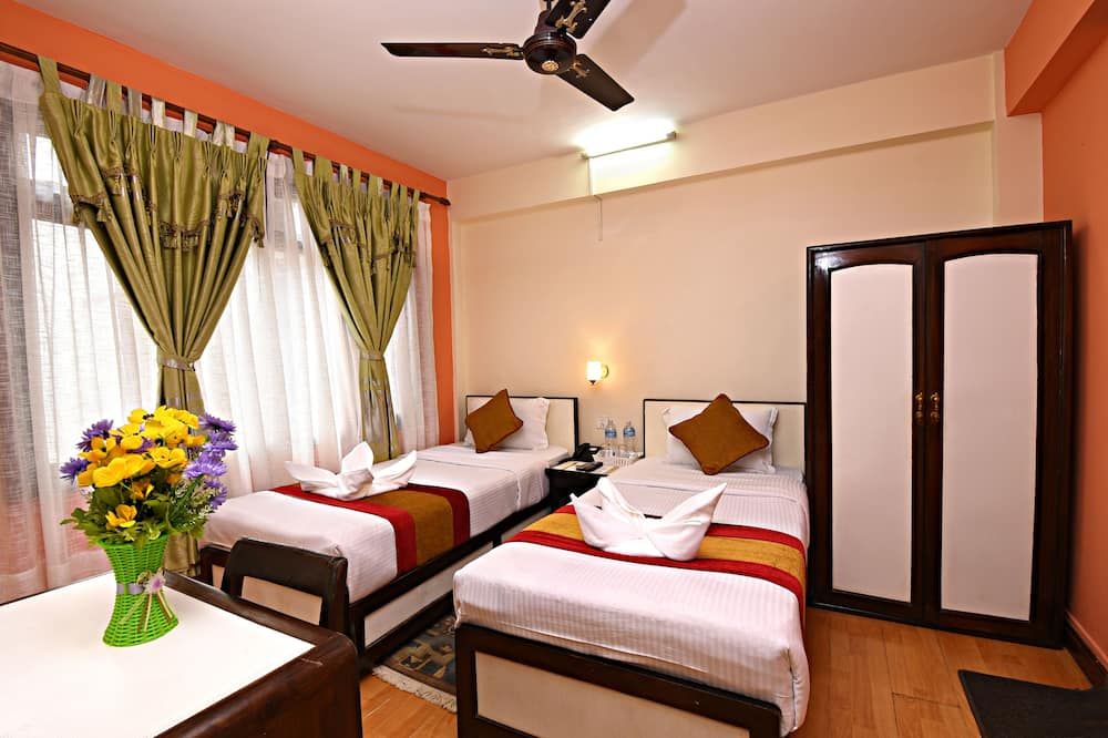 هوتل بلاجير هوم - كاثماندو - غرفة نوم