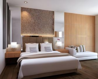Neotel Hotel City Centre - Tanjung Redeb - Bedroom