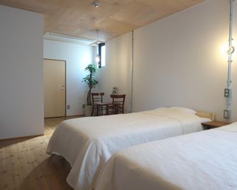 Guesthouse Cosa - Saga - Habitación