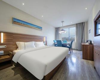 Jtour Inn Wuhan Jinyintan Avenue - Wuhan - Habitación