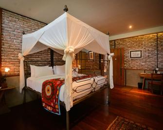 Taman Nauli Boutique Rooms - North Kuta - Habitación