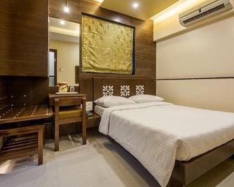 City Guest House - Dadar - Mumbai - Schlafzimmer