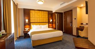 KMM Hotel - Tiflis - Yatak Odası