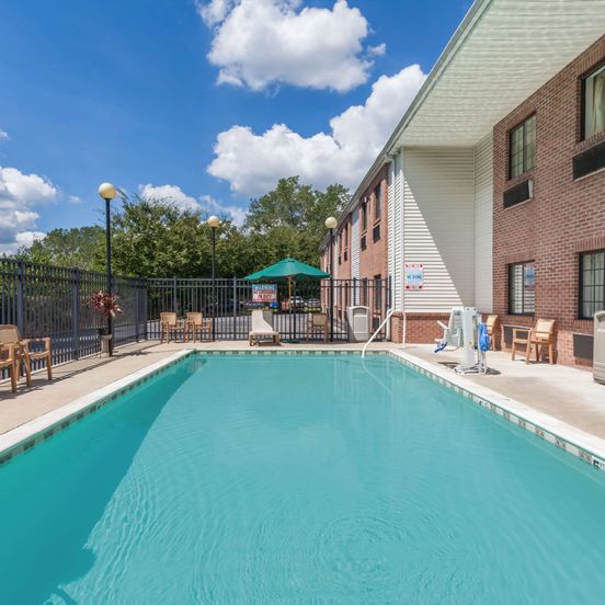 Pool view of Days Inn & Suites by Wyndham Cambridge
